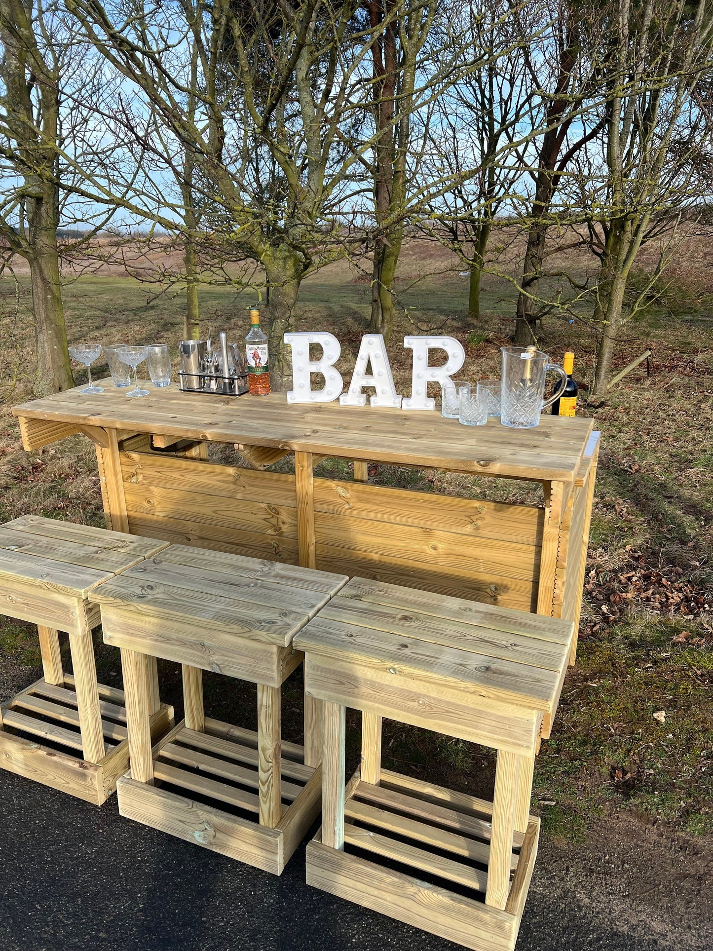 Outdoor cocktail bar, bbq server, drinks bar with stools