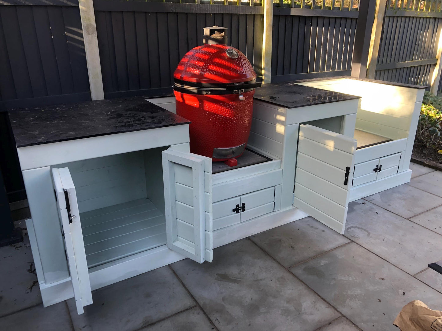Kamado/ egg table with storage cupboards, wood or compact laminate worktop, outdoor kamado/ egg storage unit with wipeable surface/ worktop.