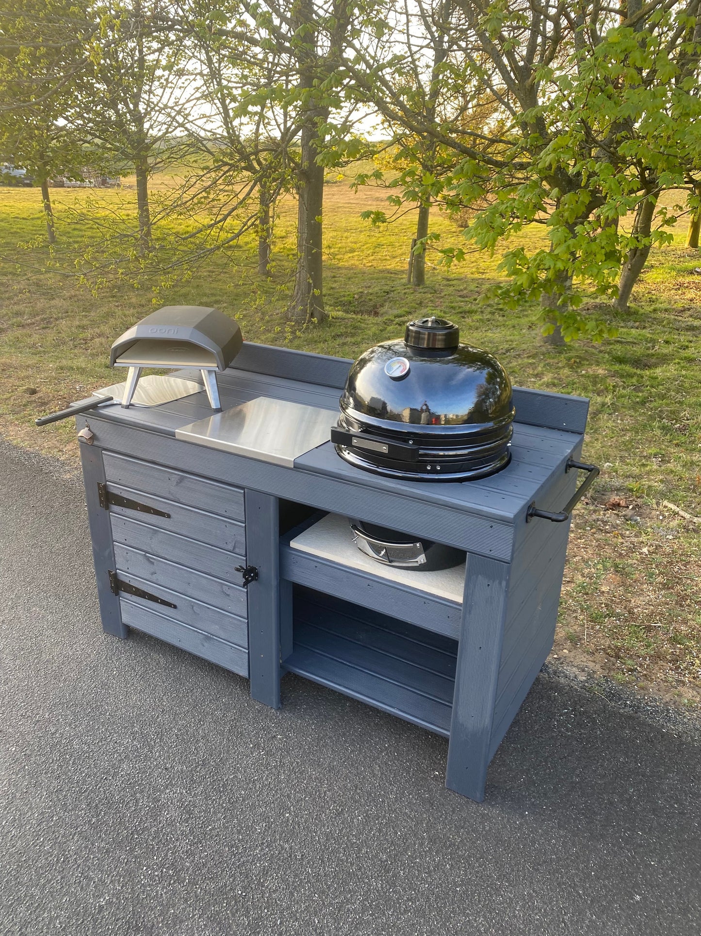 Kamado table with storage, BGE, BBQ and pizza table with storage cupboard, outdoor cooking table