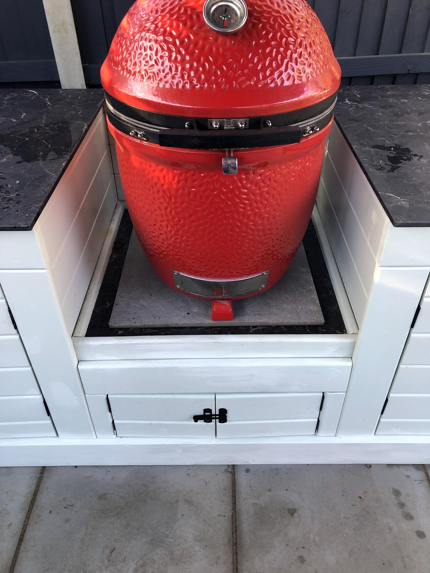 Kamado/ egg table with storage cupboards, wood or compact laminate worktop, outdoor kamado/ egg storage unit with wipeable surface/ worktop.