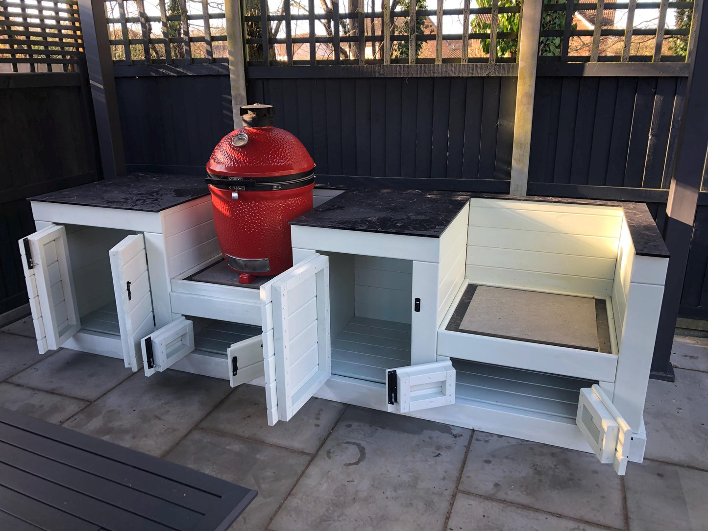 Kamado/ egg table with storage cupboards, wood or compact laminate worktop, outdoor kamado/ egg storage unit with wipeable surface/ worktop.