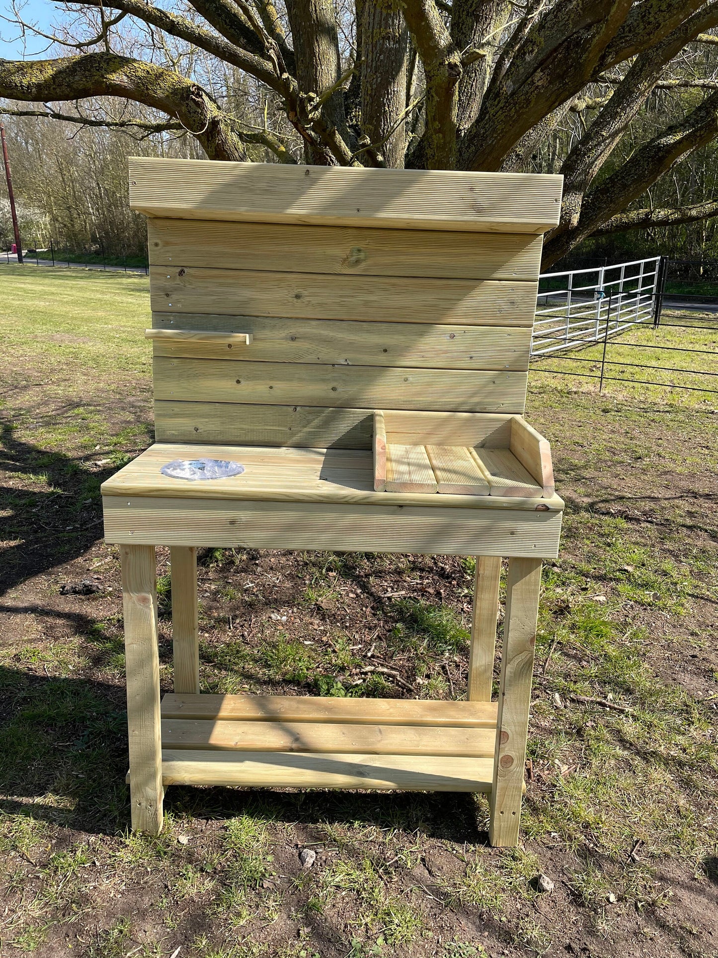 Potting table with planter top and potting tray and metal bowl for seeds/ soil