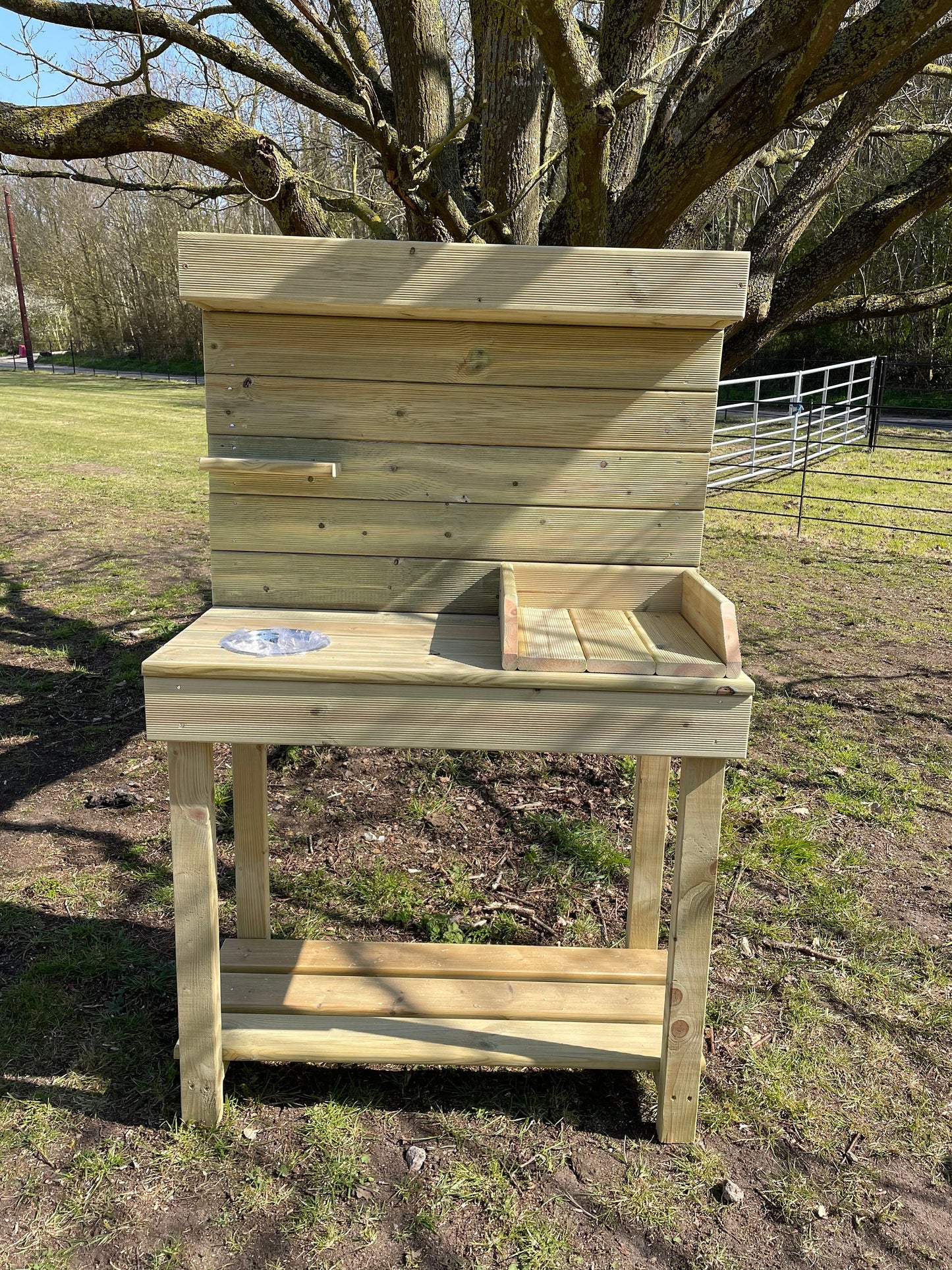 Potting table with planter top and potting tray and metal bowl for seeds/ soil