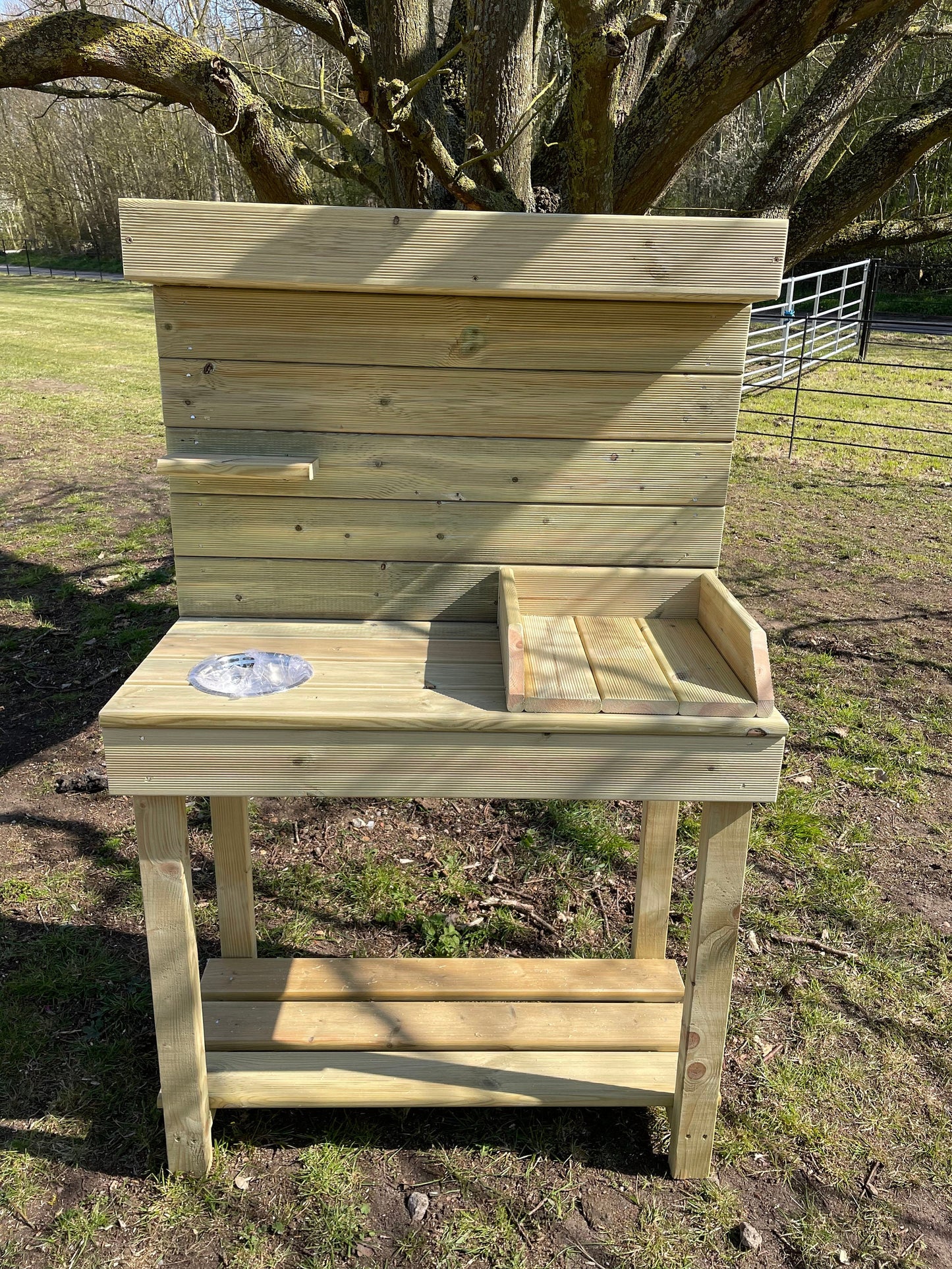 Potting table with planter top and potting tray and metal bowl for seeds/ soil