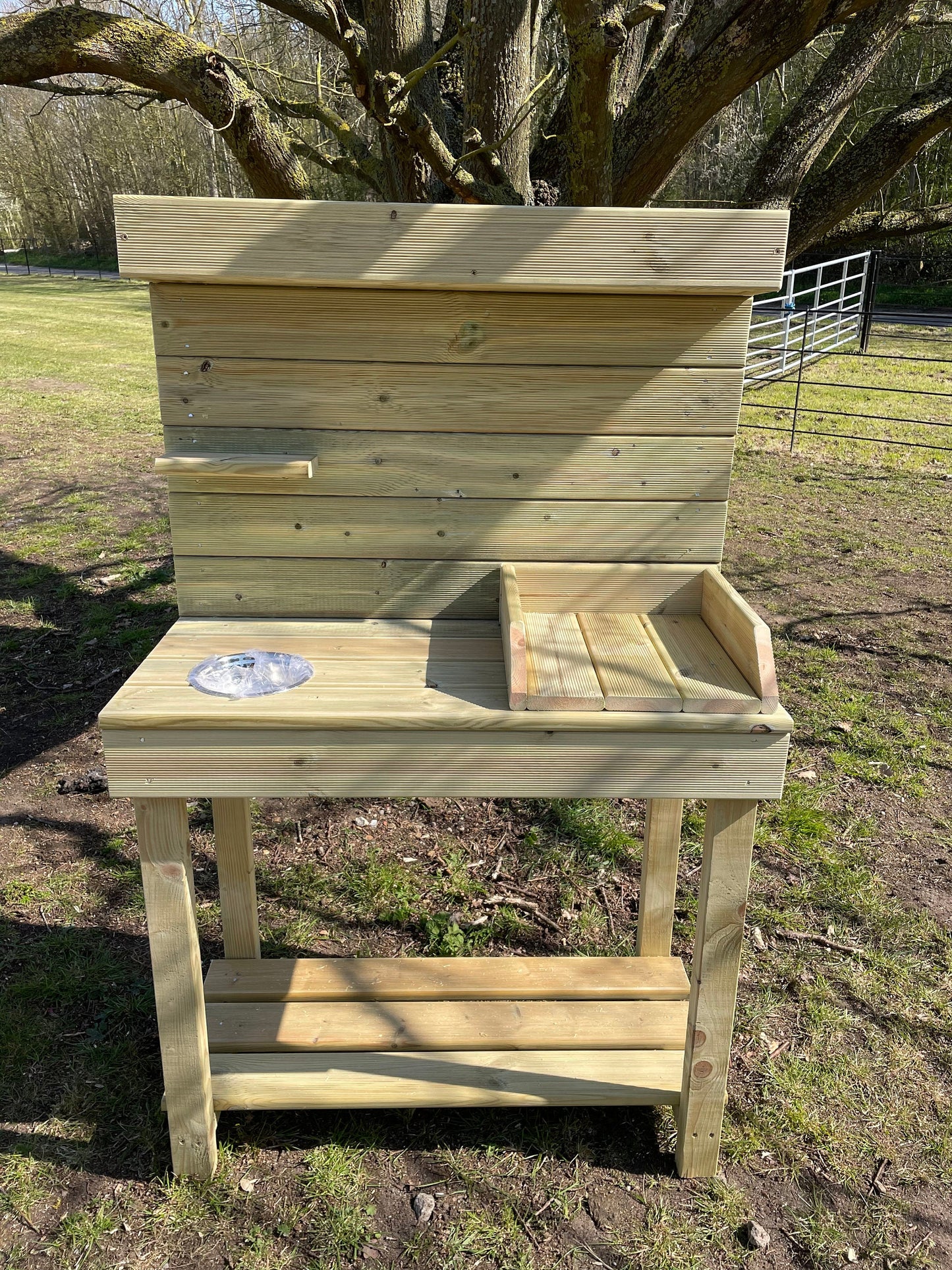 Potting table with planter top and potting tray and metal bowl for seeds/ soil