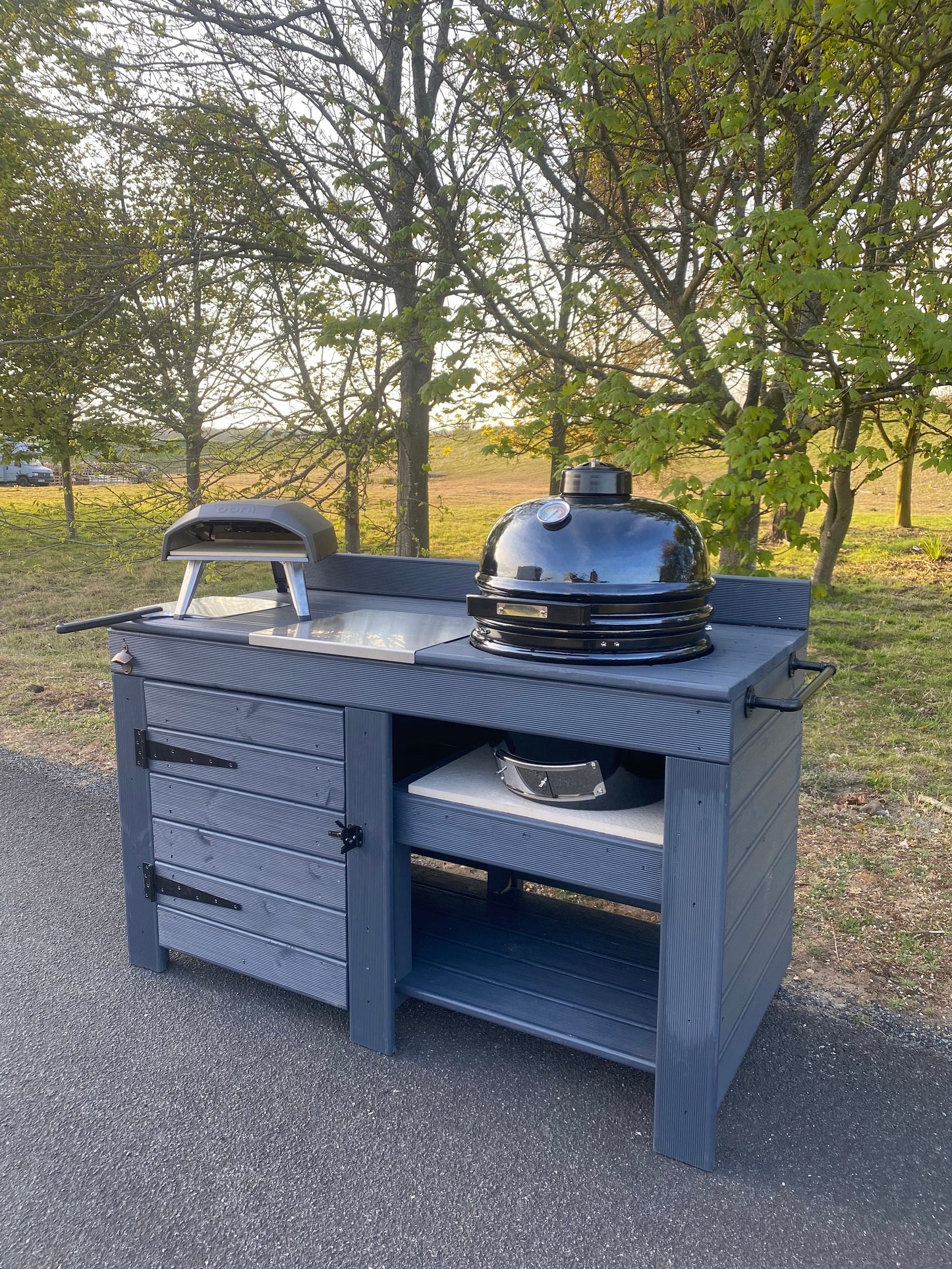Kamado table with storage, BGE, BBQ and pizza table with storage cupboard, outdoor cooking table